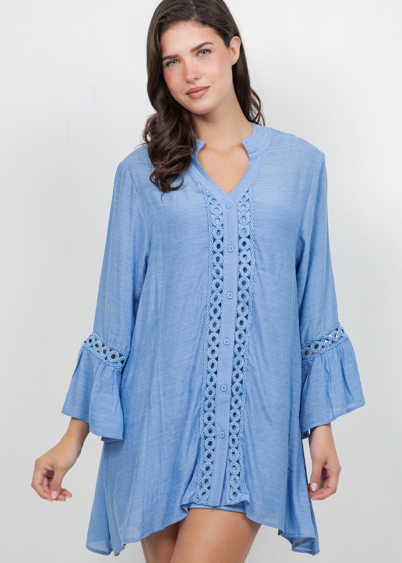 Front view of model wearing a light blue Ladies Boho Lace Trim Tunic Dress Set, featuring long sleeves and lace detail.