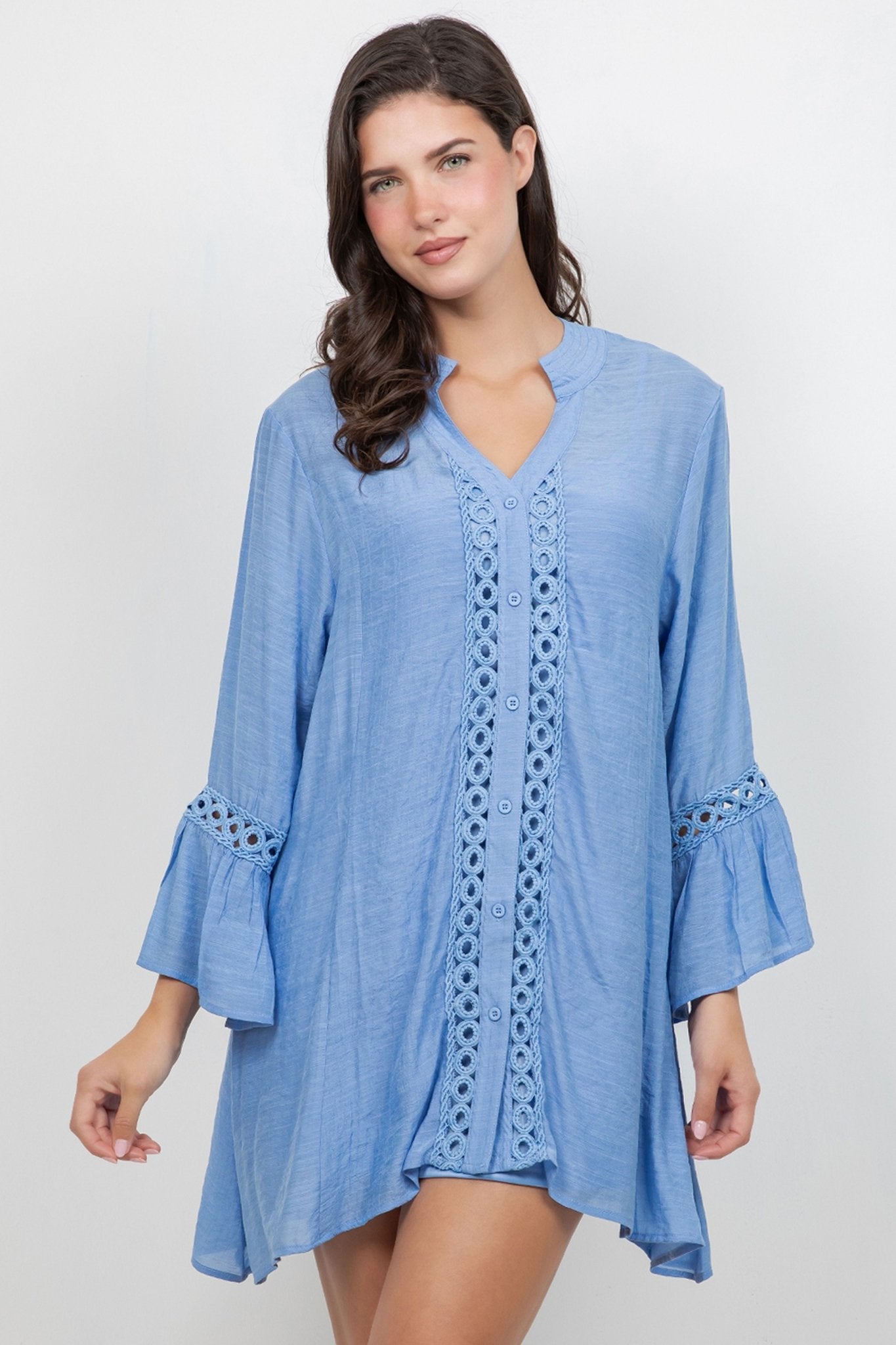Front view of model wearing a light blue Ladies Boho Lace Trim Tunic Dress Set, featuring long sleeves and lace detail.