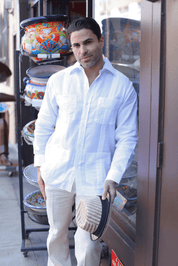 MojitoCollection Men's White Linen Guayabera: Relaxed full body pose holding a straw fedora hat