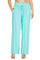 Front view of a person wearing light turquoise Ladies Smocked Waist Drawstring Palazzo Pants with pockets.