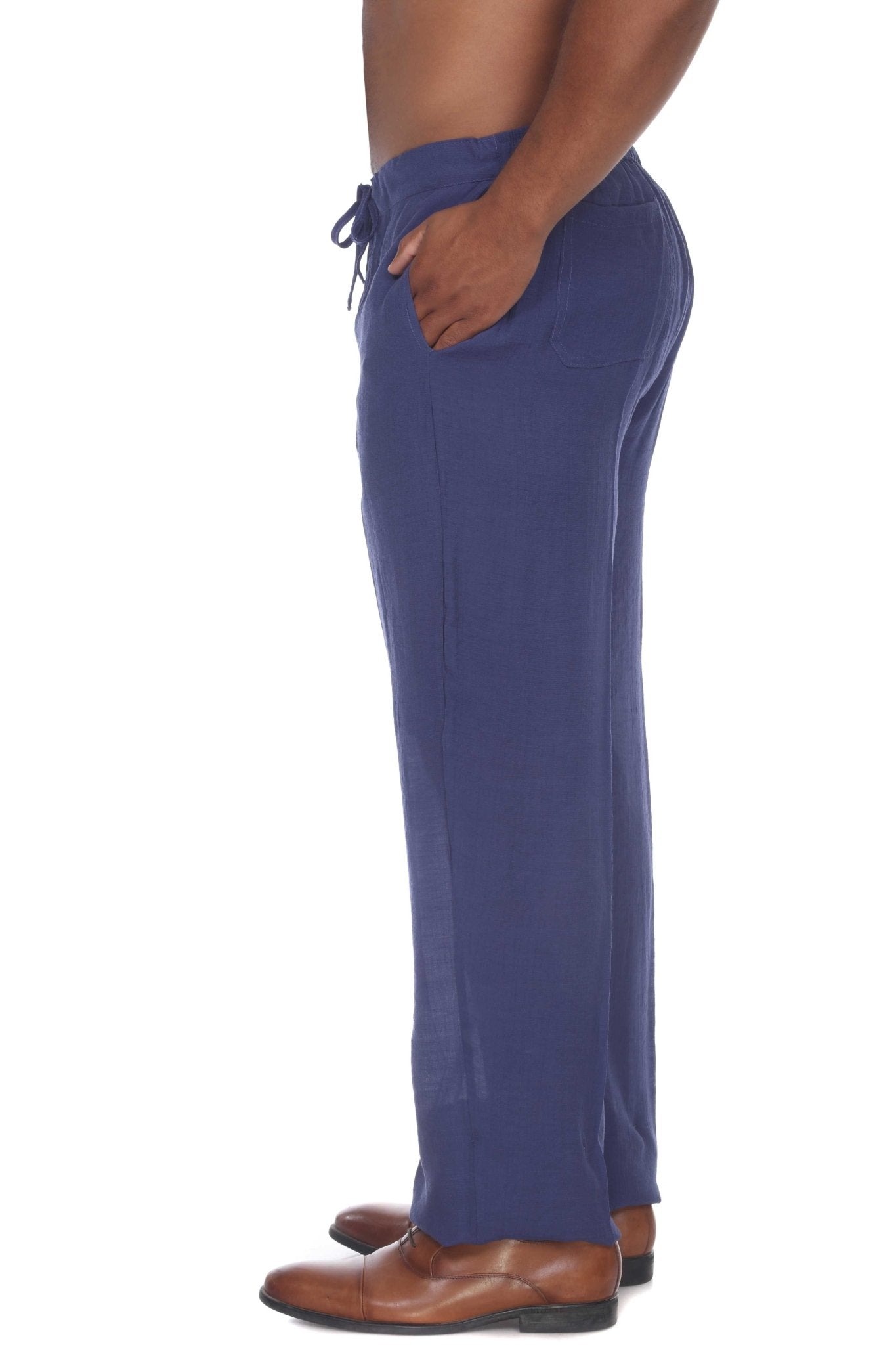 Side view of a person wearing blue Men’s Casual Drawstring Beach Pants, with a hand in the pocket.