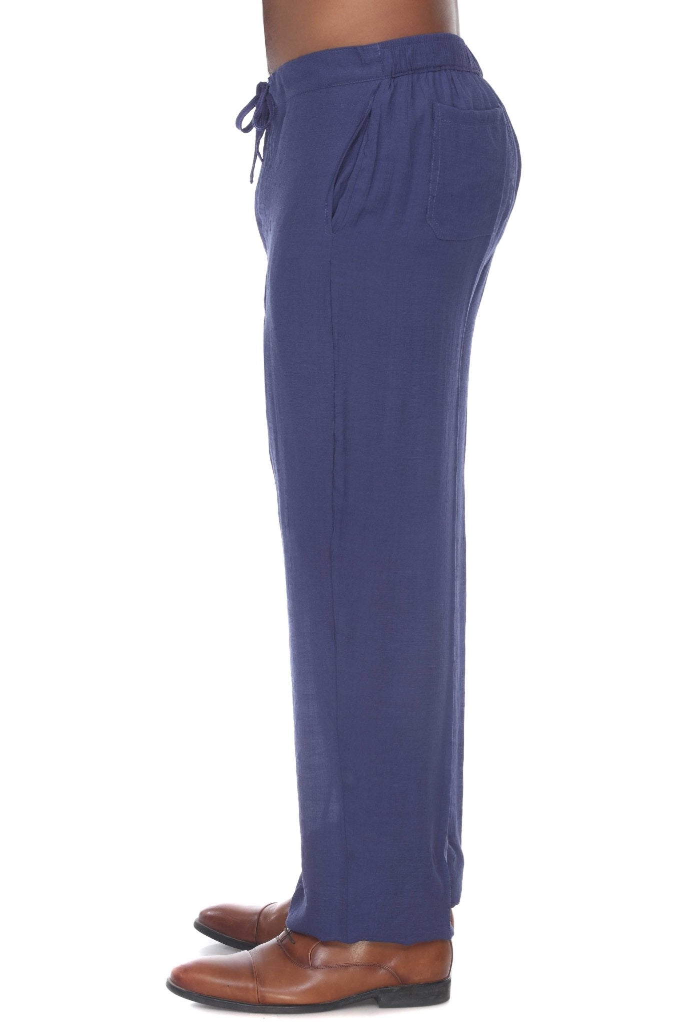 Side view of a person wearing blue Men’s Casual Drawstring Beach Pants with pockets and brown shoes.