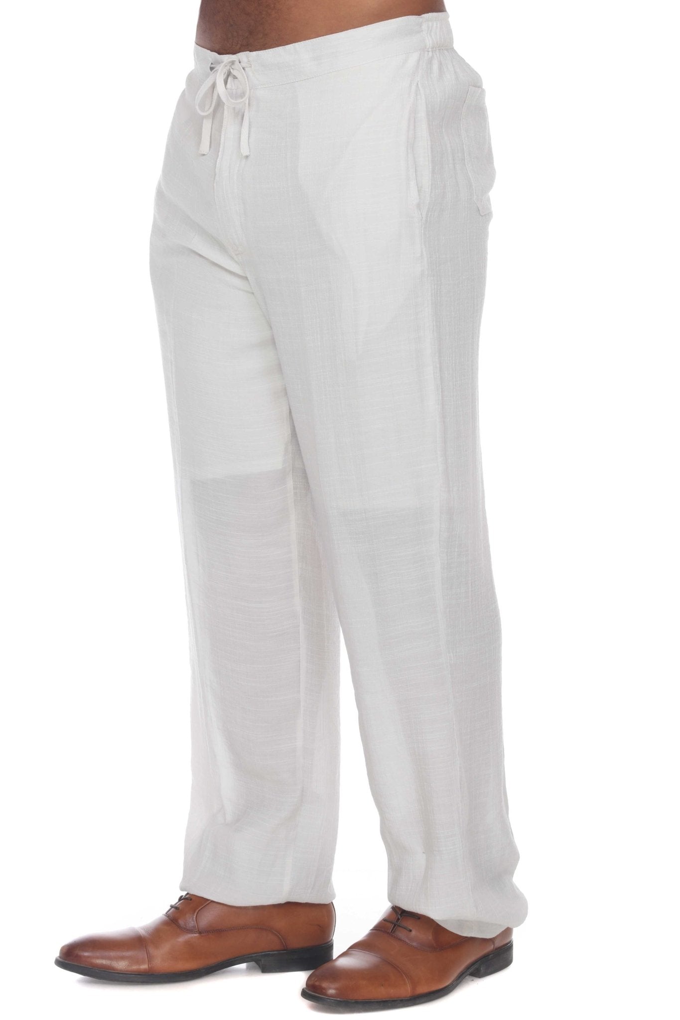 Front view of a person wearing white Men’s Casual Drawstring Beach Pants and brown leather shoes.