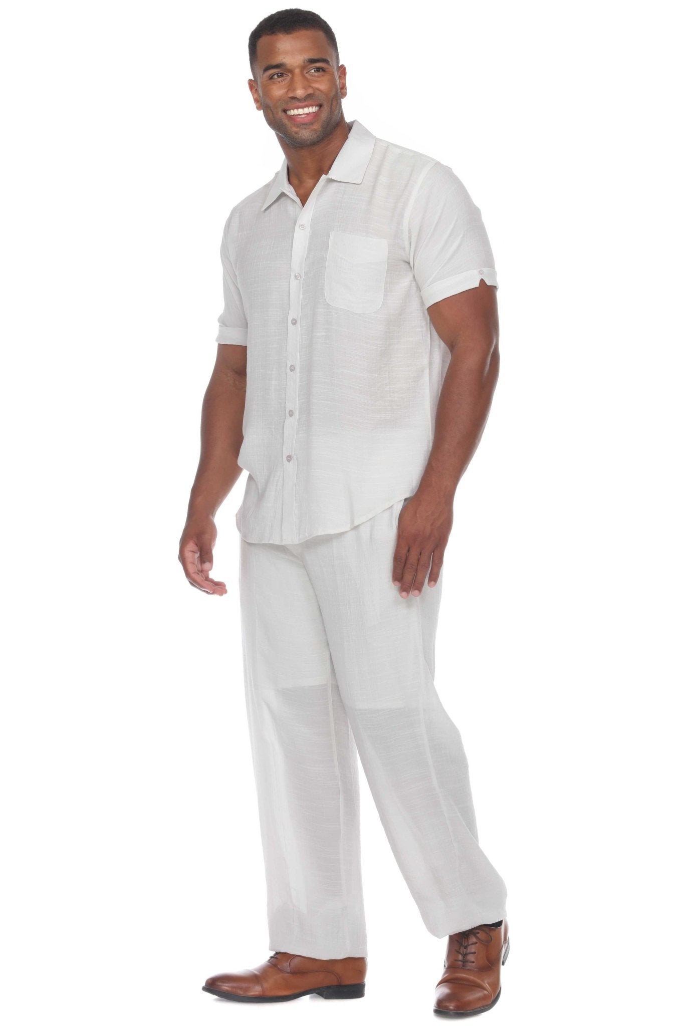 Man wearing white Men’s Casual Drawstring Beach Pants and matching shirt, angled view.