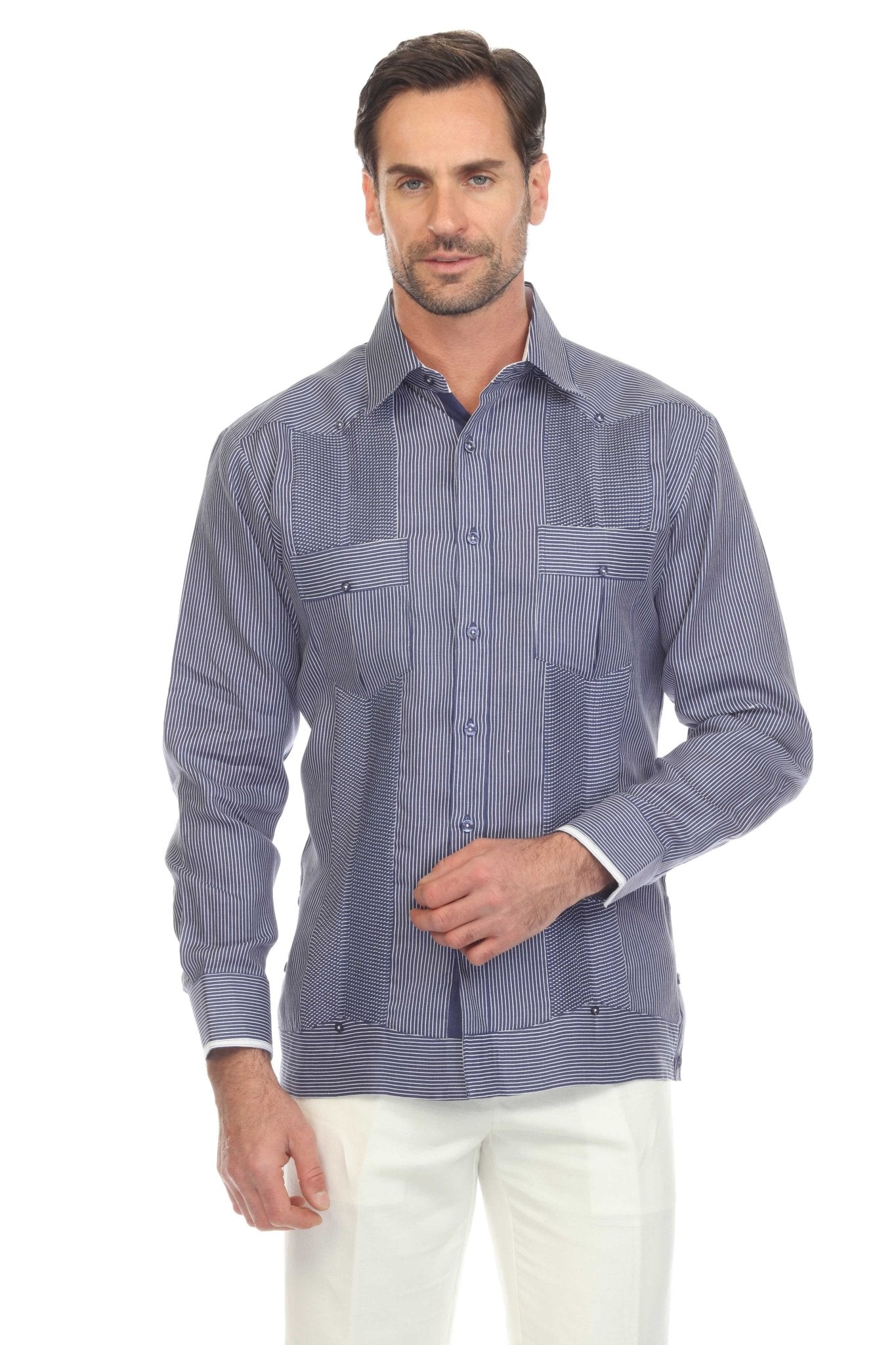 Front view of a man wearing a blue striped 100% Linen Contrast Panel Guayabera Shirt Long Sleeve and white pants.