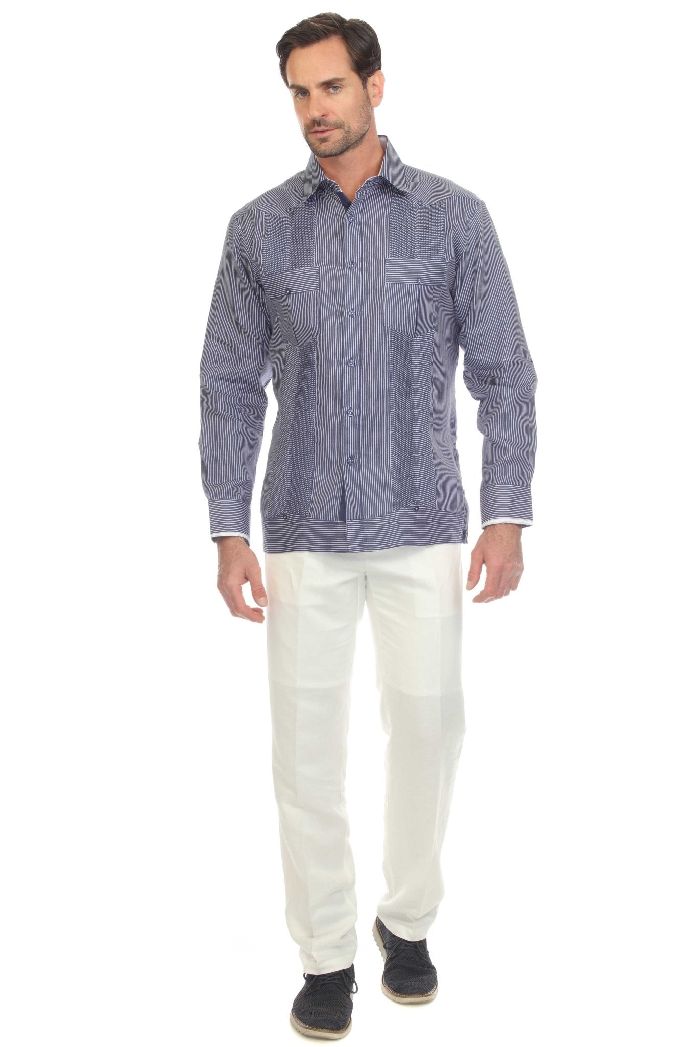 Front view of a man modeling the striped linen contrast panel guayabera shirt, long sleeve, paired with white pants.