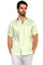 A man models the light green Big & Tall 100% Linen Classic Short Sleeve Guayabera Shirt, with four front pockets.