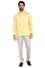 Front view of a man wearing a yellow, long-sleeved, linen Men’s Big & Tall Guayabera Shirt with four pockets.