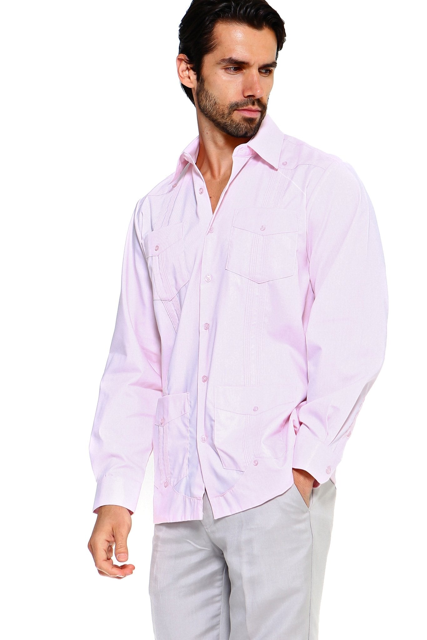 Man wearing a light pink Big & Tall Guayabera Shirt, shown at a slight angle with visible front pockets.