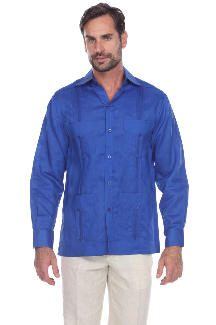 Front view of a man wearing a white Men's Linen Classic Four-Pocket Long Sleeve Guayabera Shirt.
