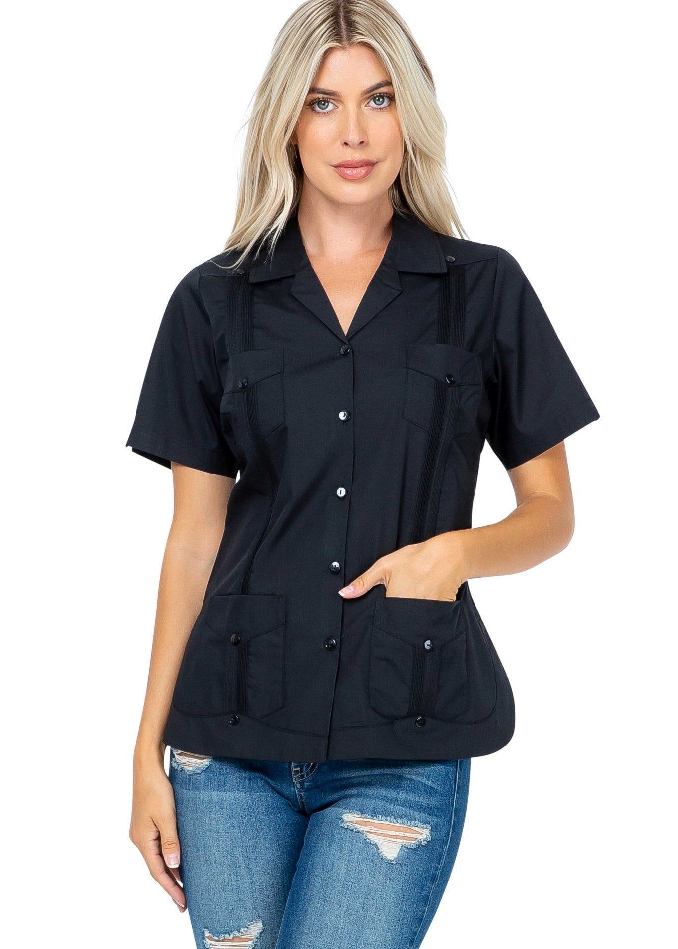 Front view of a woman wearing a black Women's Short Sleeve Guayabera with 4 Pockets.
