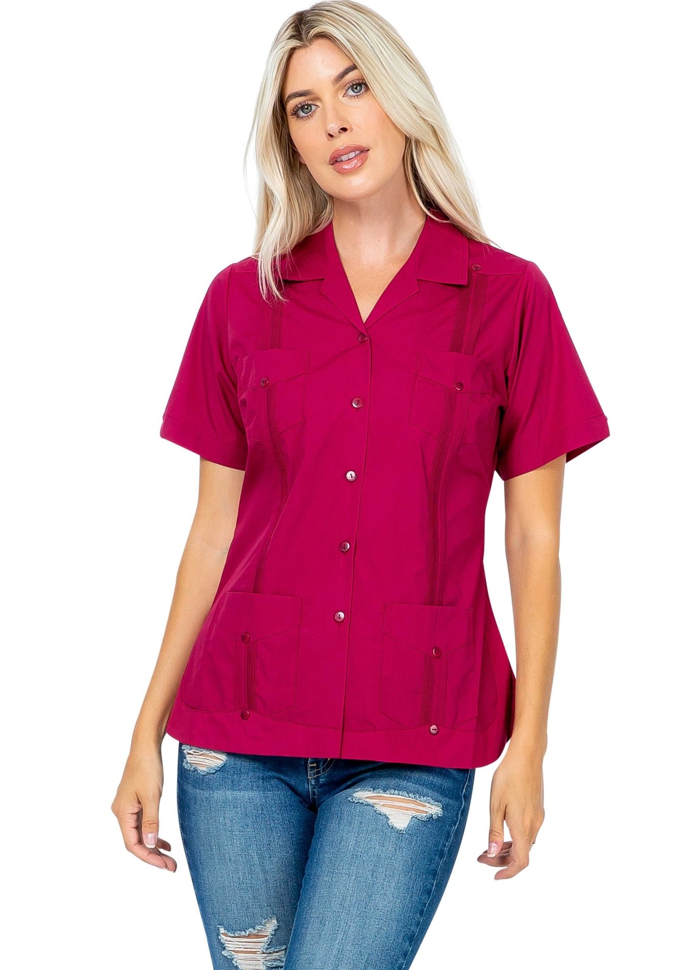 Front view of a blonde model wearing a magenta Women's Short Sleeve Guayabera with 4 pockets.