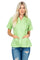 A woman models a light green, short sleeve Women's Short Sleeve Guayabera with 4 Pockets, hands in the bottom pockets.