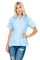 A blonde woman models a light blue Women's Short Sleeve Guayabera with 4 Pockets, shown at a front angle.