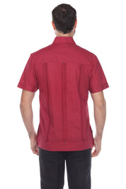 Back view of the burgundy guayabera shirt showing the structured look and traditional vertical pleated styling.