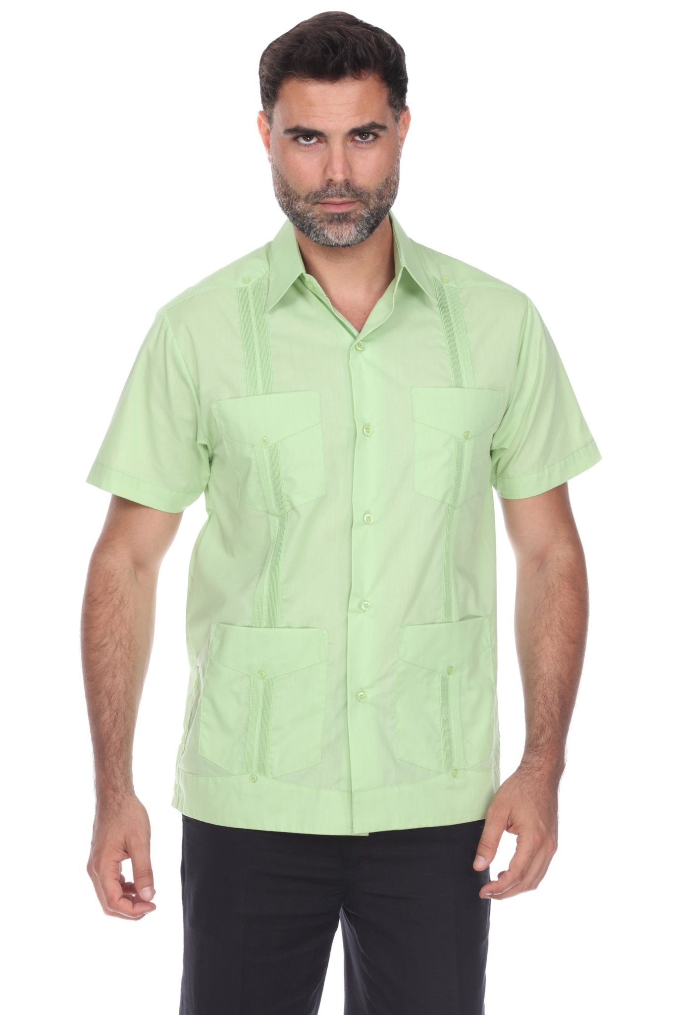 Men’s short sleeve guayabera shirt in light green featuring a classic 4-pocket front and traditional embroidered accents.