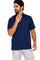 A man models a navy blue Men's Plus Size Classic Four-Pocket Short Sleeve Guayabera Shirt.