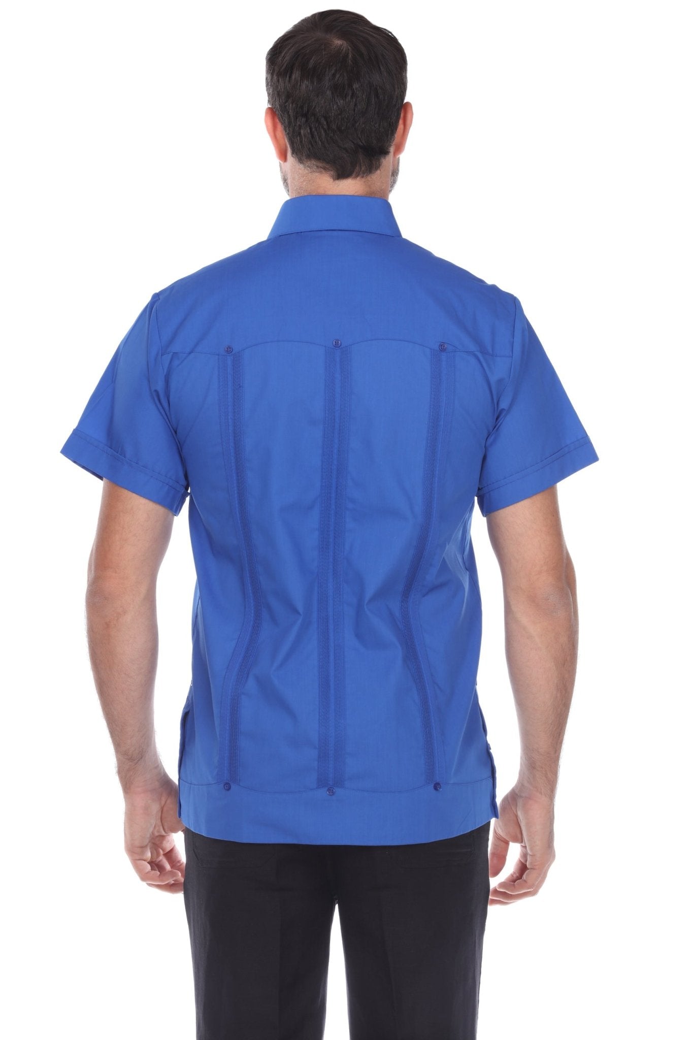 Back view of the royal blue cotton-blend guayabera showcasing the heritage three-panel pleats and button accents.