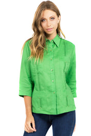 Front view of the women’s 3/4 sleeve 100% linen guayabera shirt in a vibrant bright green color.