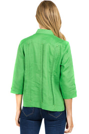 Back view of the women’s bright green linen guayabera shirt, showing the traditional pleated panel details.