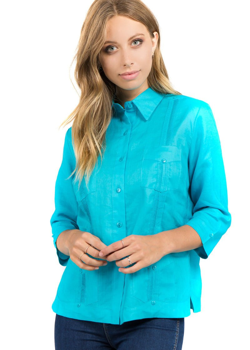 Front view of the women’s turquoise blue linen guayabera shirt, featuring a 4-pocket Cuban style.