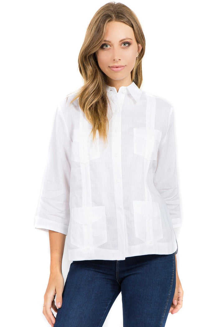 Front view of a white 100% linen guayabera shirt for women with authentic 4-pocket construction and embroidery.