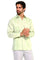 Man wearing a light green long-sleeve, 4-pocket Men’s Big & Tall Guayabera Shirt.